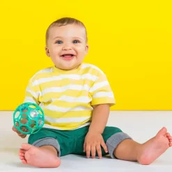 Balle hochet sensoriel vert