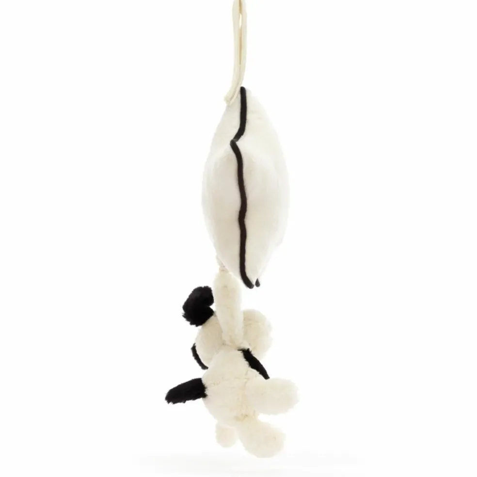 Peluche musicale Chien noir et crème (30 cm)