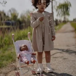 Poussette pour poupée en métal rose