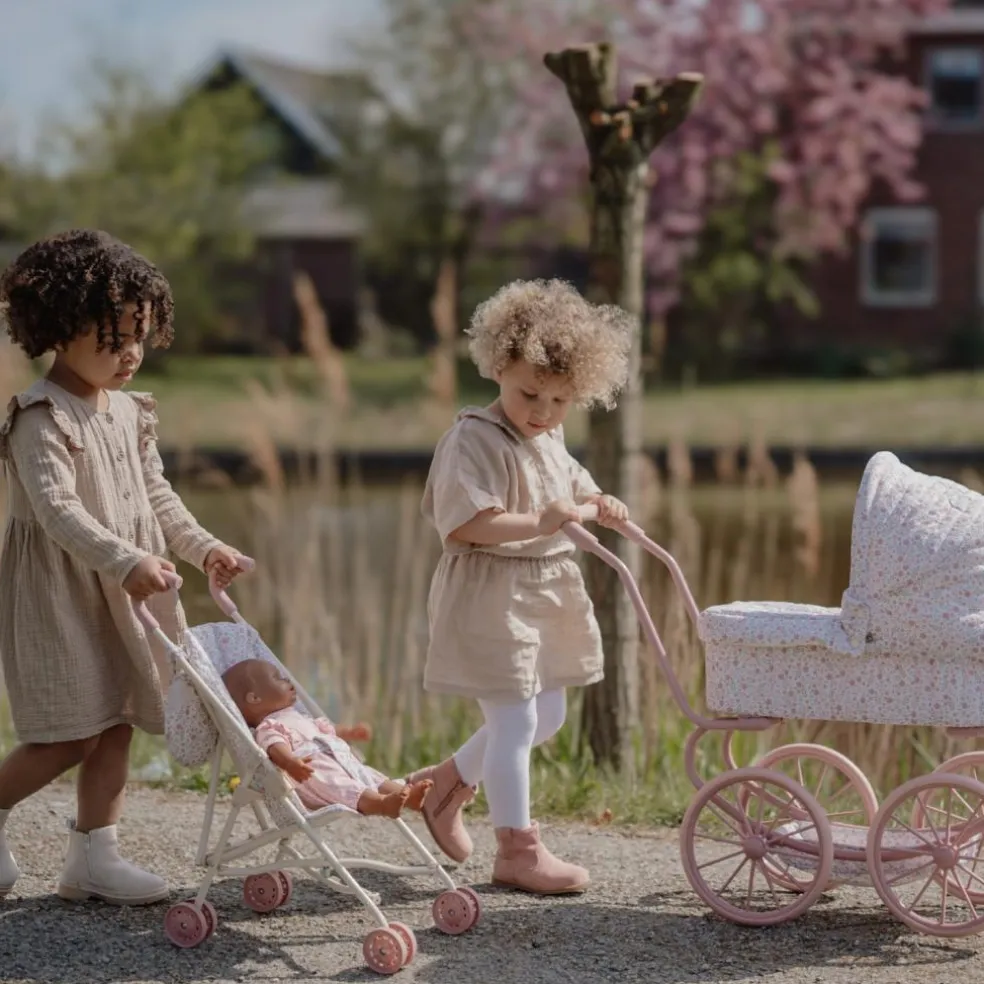 Poussette pour poupée en métal rose