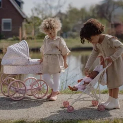 Poussette pour poupée en métal rose